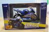 Picture of Valentino Rossi Yamaha YZR-M1 2004 1:18 Maisto