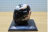 Picture of Marco Melandri Nolan helmet 2005 1:5 breuk