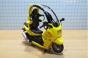 Afbeelding van BMW C1 1:16 yell.