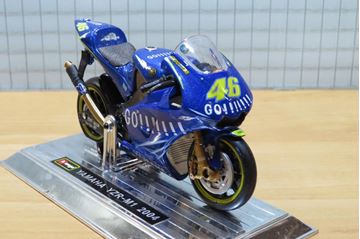 Afbeelding van Valentino Rossi Yamaha YZR-M1 2004 1:18 Bburago